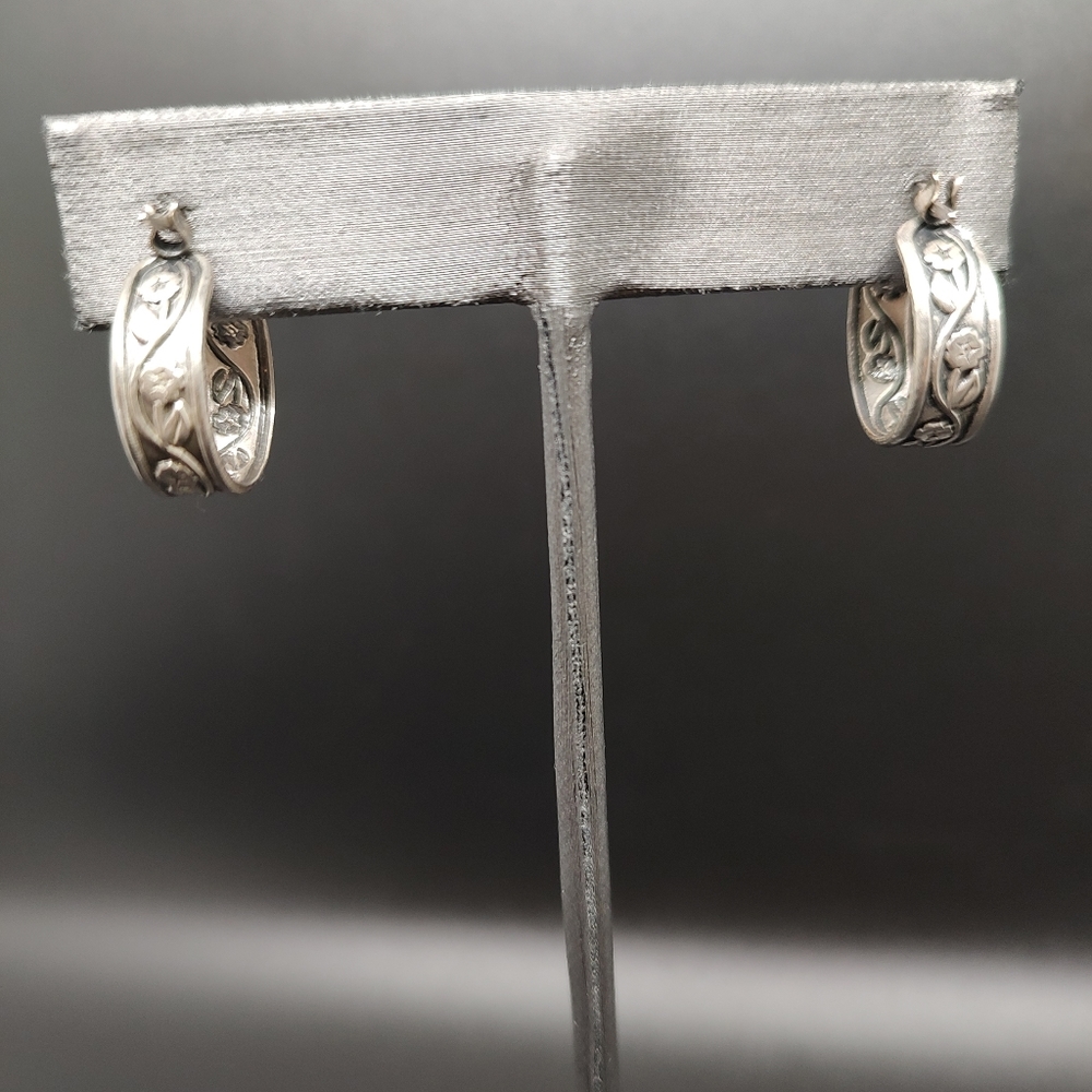 Small silvertone ornate hoops